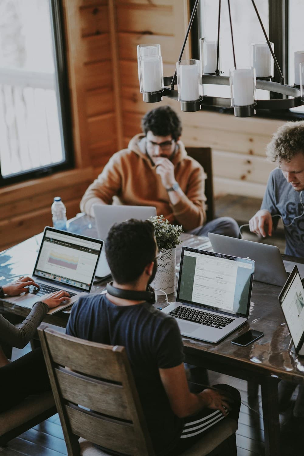 People connecting and collaborating in a bright workspace